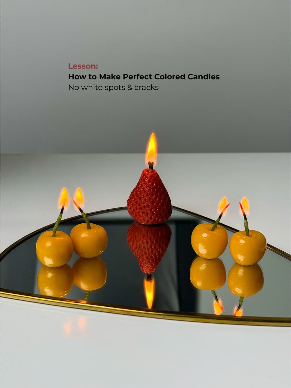Perfectly coloured cherry and strawberry candles
